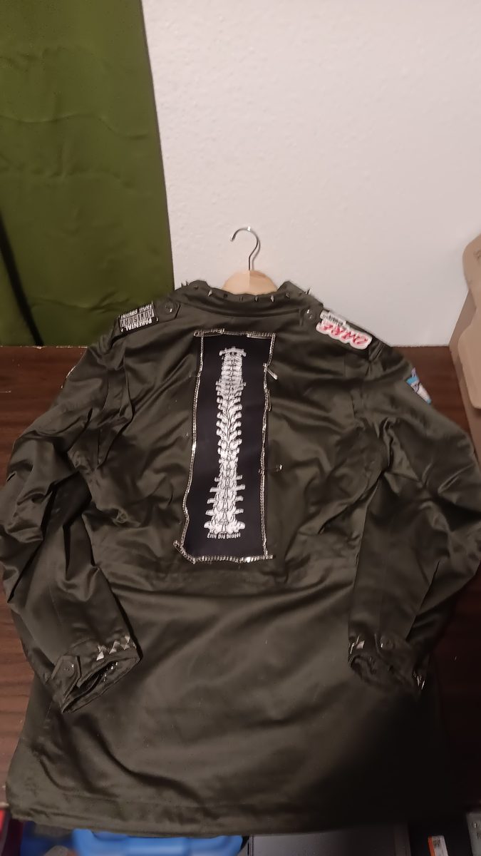 Spine Collector jacket — back with large spine backpatch