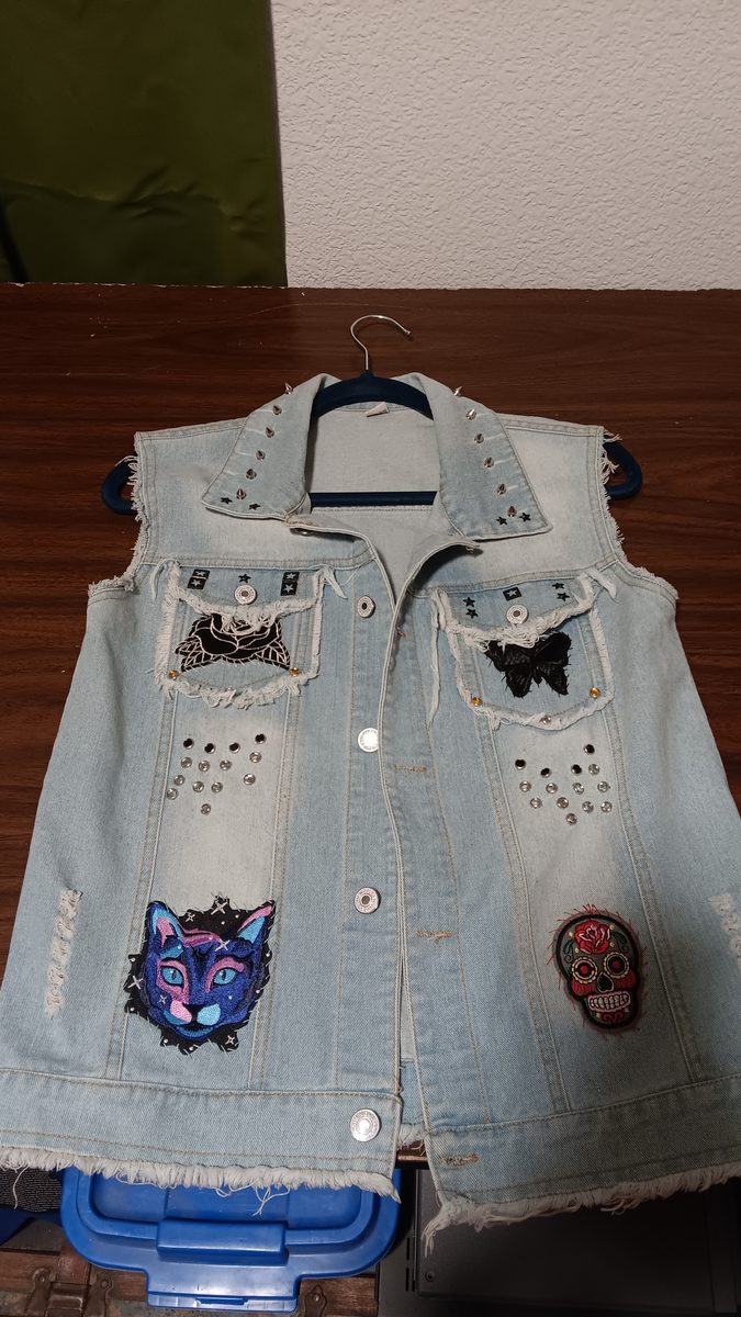 Stitch & Skull vest — front view with studs, sugar skull, and Stitch patch
